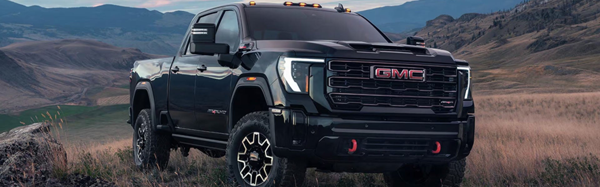 Sierra 2500 HD in black with attracting MAC wheel and head lights on